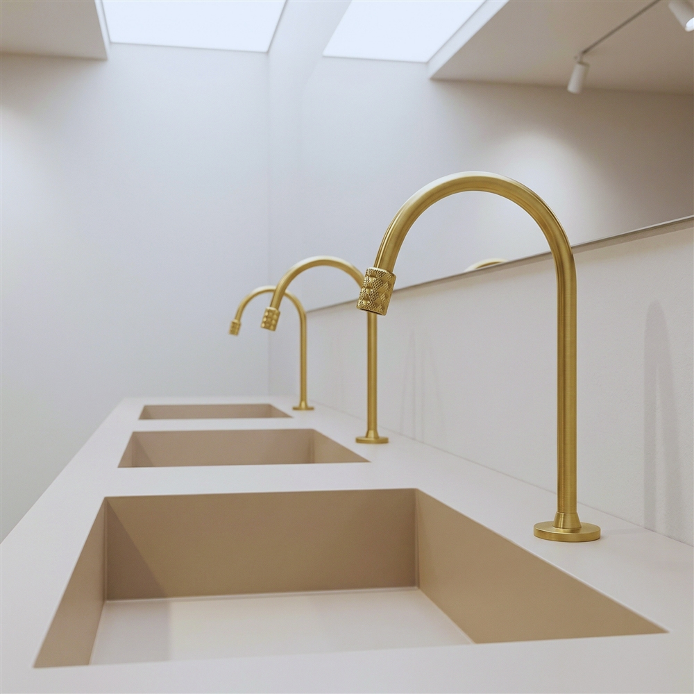 Modern architectural workspace with specification documents and bathroom fixture drawings